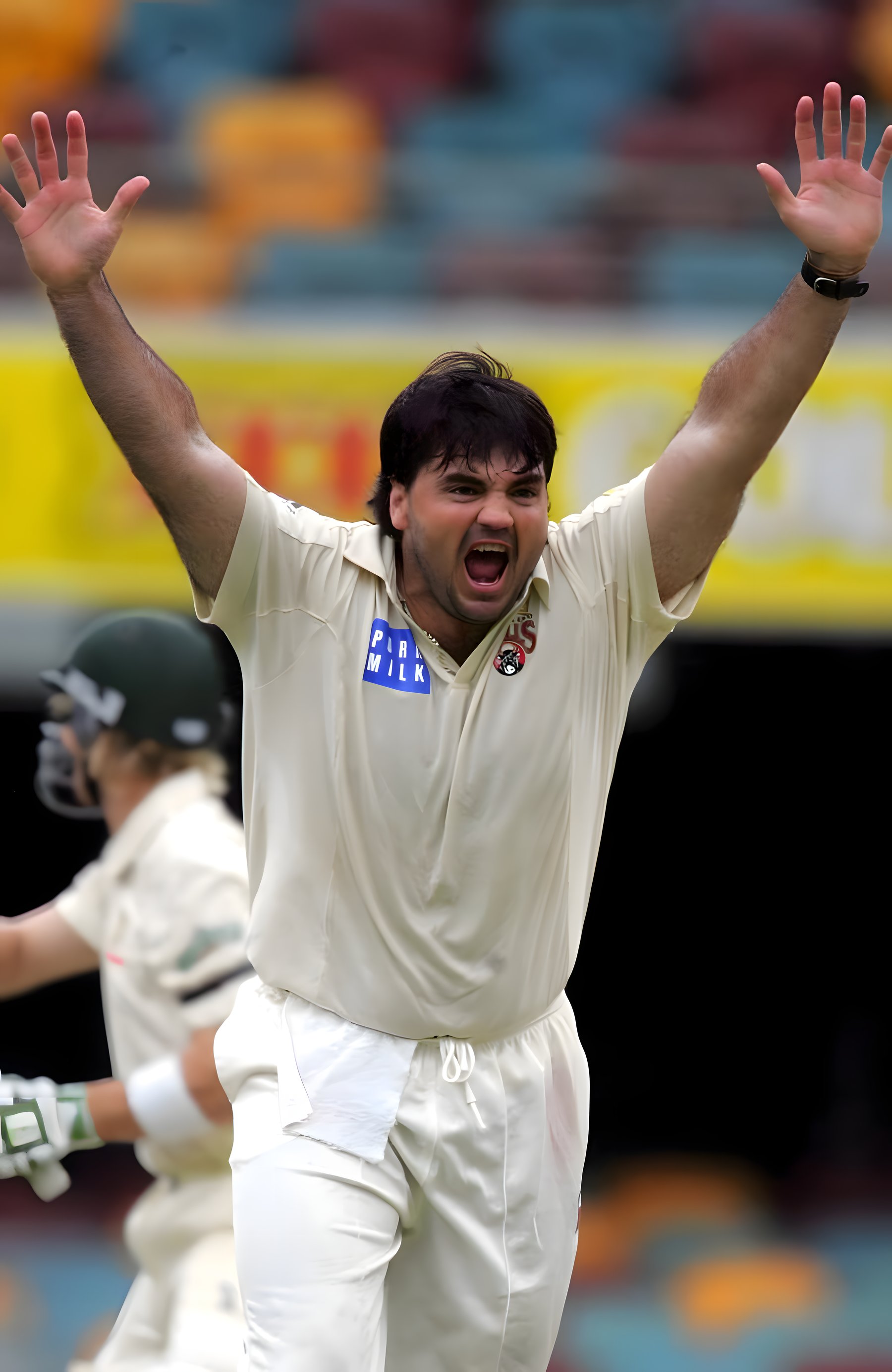 Joe Dawes bowling for the Queensland Bulls